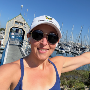 Woman smiling at a marina