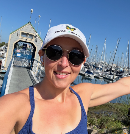 Woman smiling at a marina